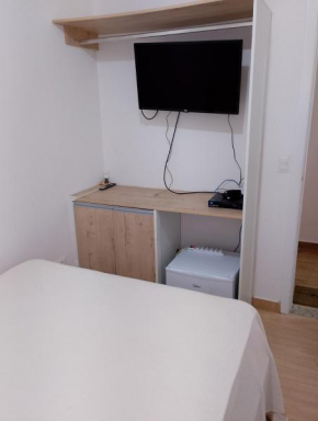 casa a uma quadra da praia